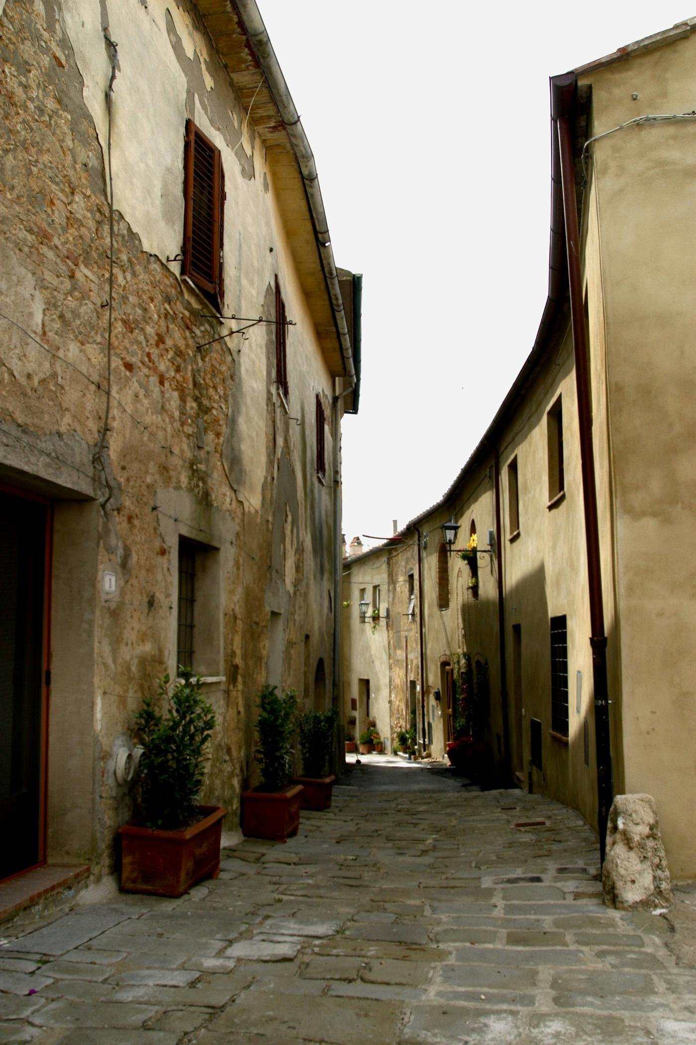 A quiet stone street in a small Italian town