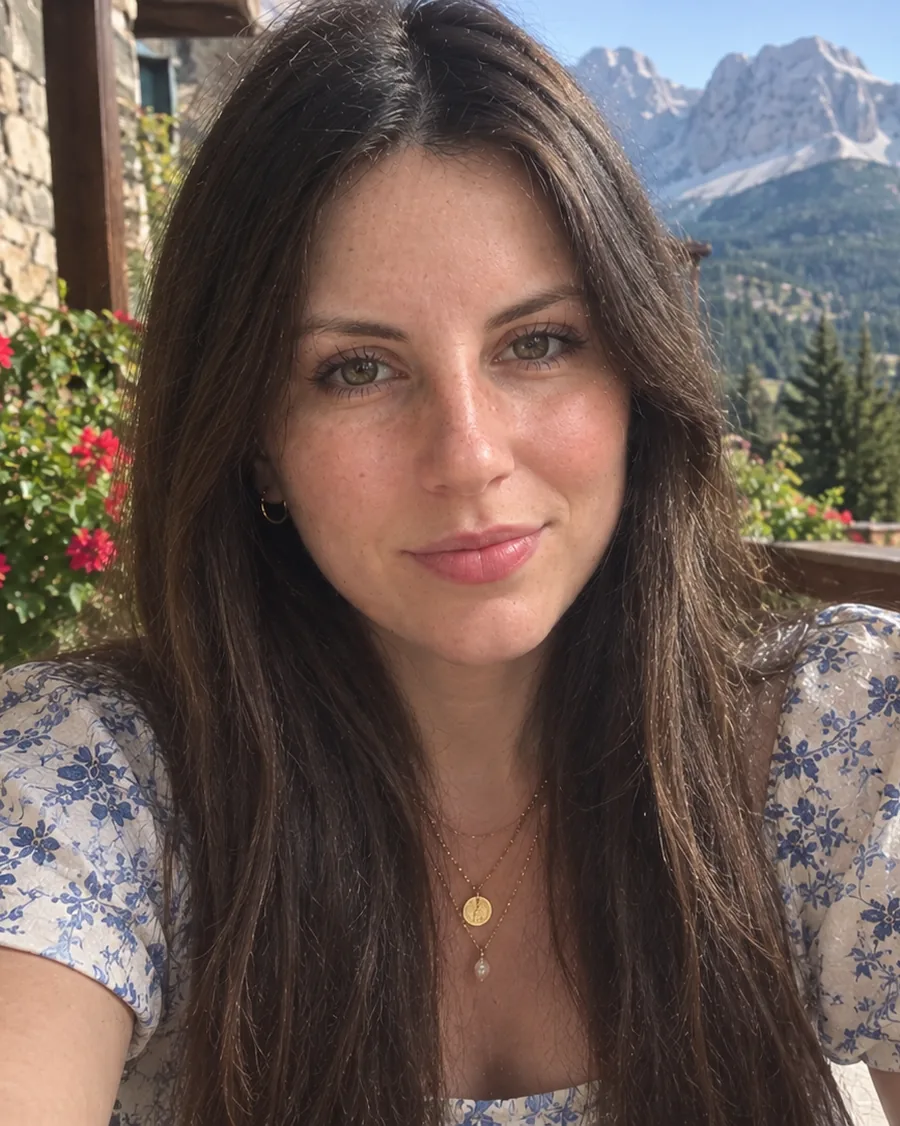 Luciana, Italian teacher, on a mountain terrace in the Italian Dolomites