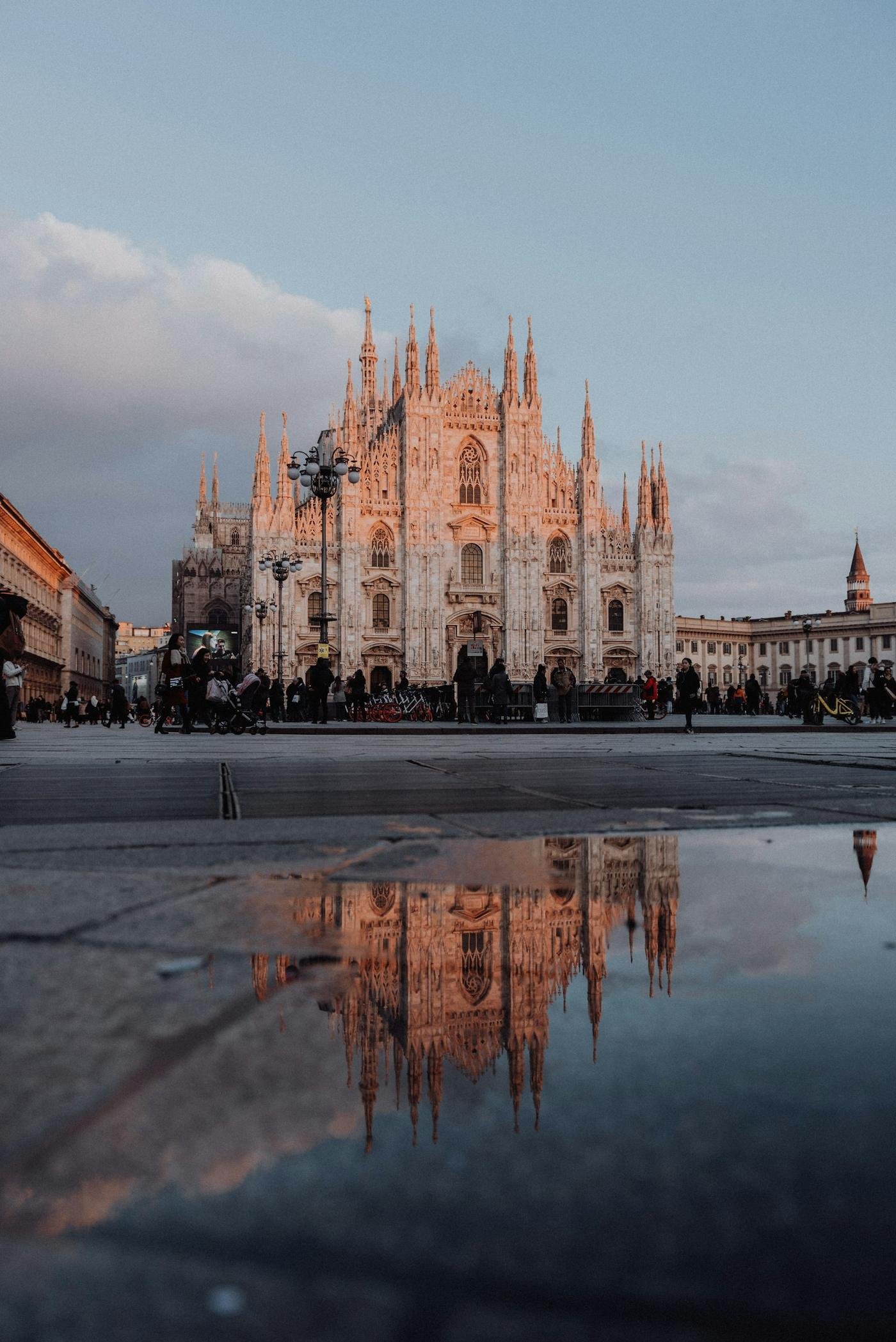 Milan cathedral reflected in the square